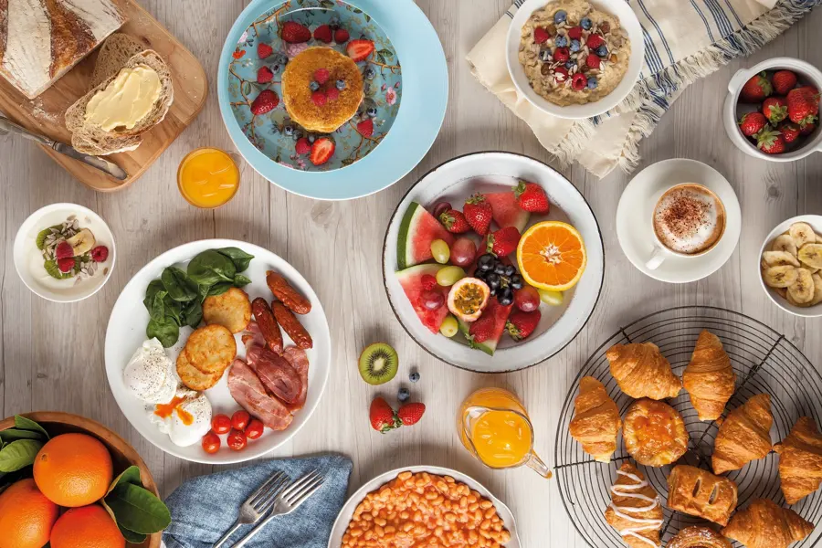 An overhead breakfast buffet spread