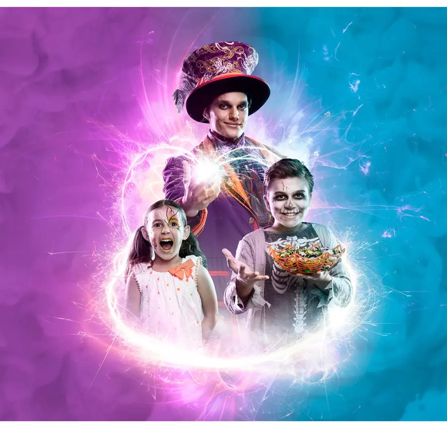 Halloween key art of a magician and children in a swirl of light